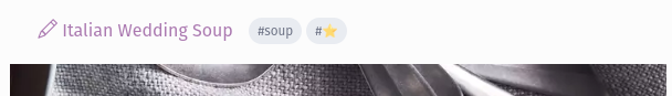 Auto-generated description: A text reads Italian Wedding Soup followed by tags #SOUP and a star emoji.